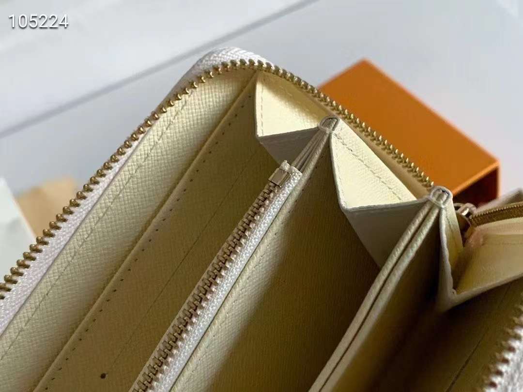 ルイヴィトン モノグラム ファスナー二つ折り財布 m60017