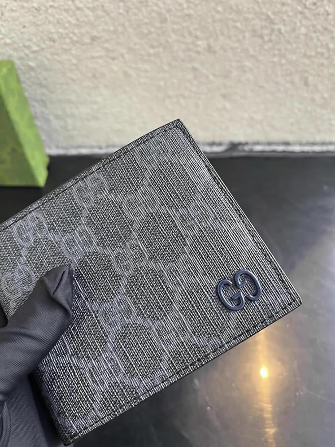 グッチ ggスプリーム キャンバス 二つ折り財布 ネイビー/ブラック ブルー金具 guca768248
