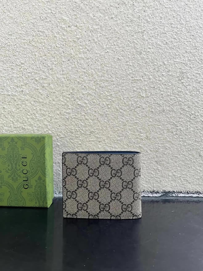 グッチ ggスプリーム キャンバス 二つ折り財布 ベージュ/ネイビー ブルー金具 guc768243