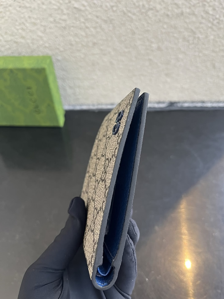 グッチ ggスプリーム キャンバス 二つ折り財布 ベージュ/ネイビー ブルー金具 guc768243